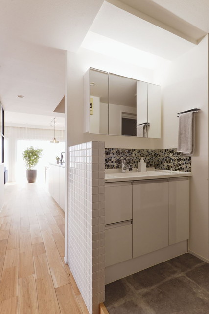 洗面室もリビングの一部に設けた｜家を仕切らず広く暮らすワンルームリフォーム・リノベーション事例